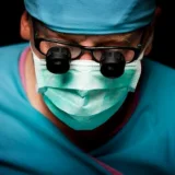 image of a doctor in handcuffs for medical malpractice