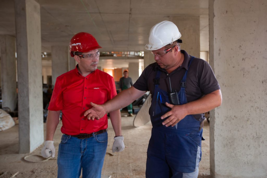 two workers at constructions site in IA