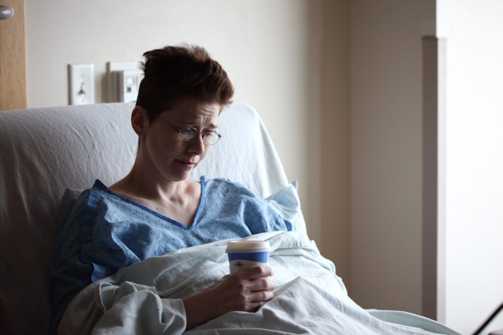 Woman in hospital bed
